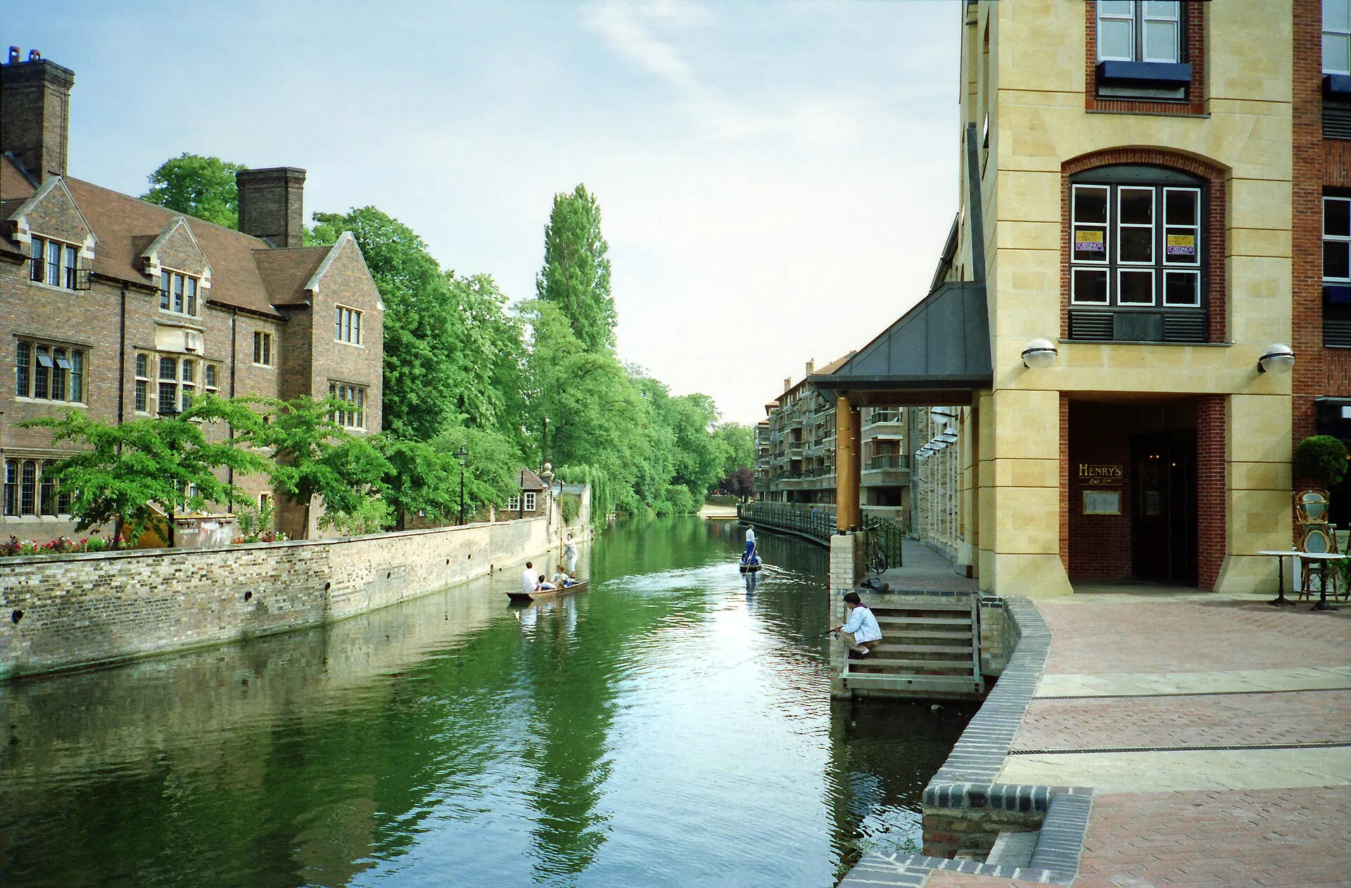 Punts on the River Cam at Quayside in central Cambridge, England, with riverside buildings beyond
